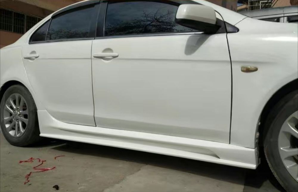 Продам накладки порога для Lancer X