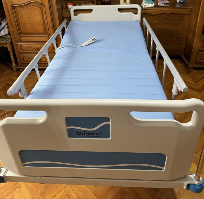Pat medical electric pentru persoane inmobilizate la pat