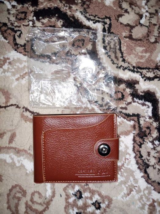 Продам мужское портмоне коричневого цвета