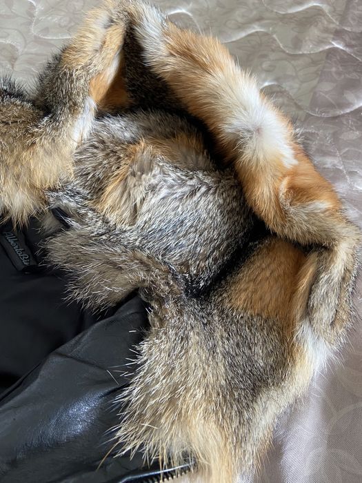 Меховая жилетка