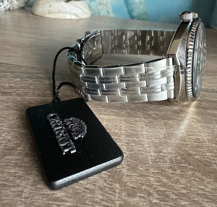 *Нов* часовник ORIENT WORLD MAP RA-AA0E02E