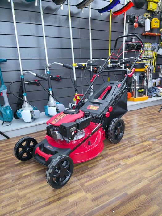 Газонокосилка бинзин и электр газон у'ргич