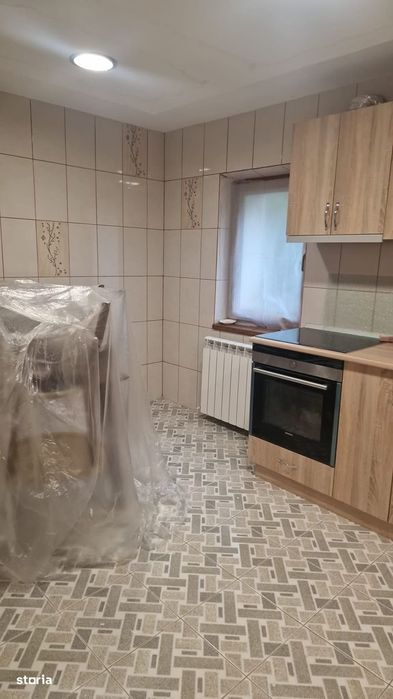 Apartament la parter si curte proprietate