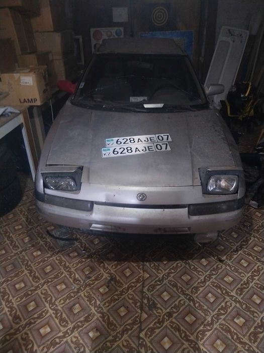 Мазда Mazda 323f Bg