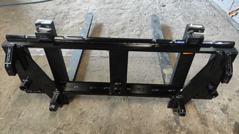 Палетни вилици за челен товарач