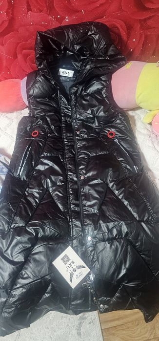 Продам безрукавку пуховик