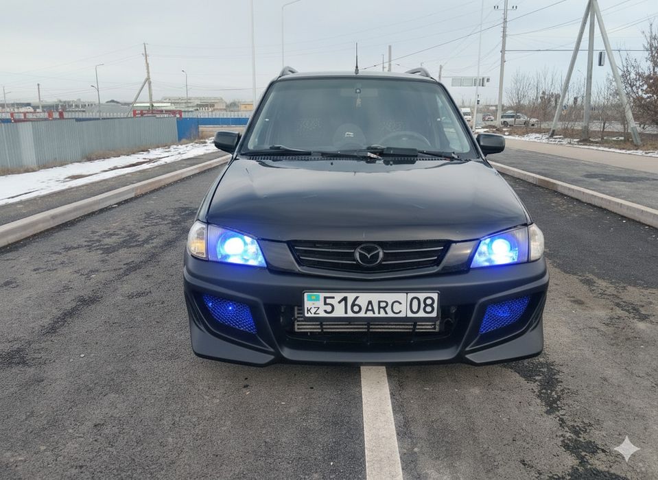 Mazda Demio 2003 г