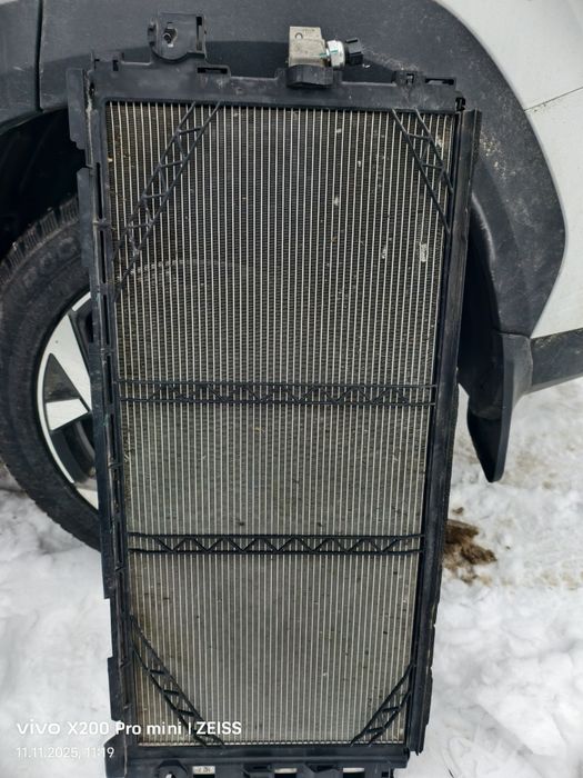 Радиатор от geely atlas fx11