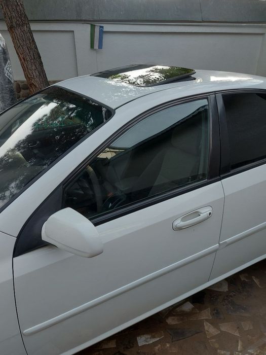 Ласетти 1,6. Цвет белый.