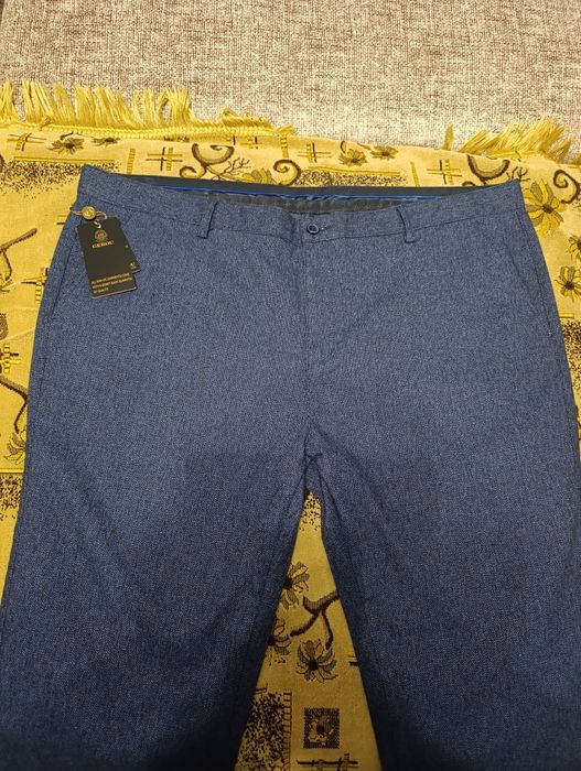 Продам новые брюки ,рубашки,костюм