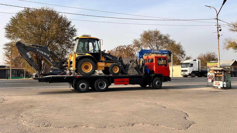 Грузовой эвакуатор-манипулятор