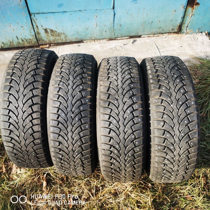 Продам шипованные шинны