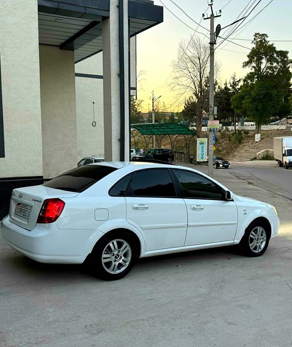 Ласетти 1,6 автомат 2013. Бензин.