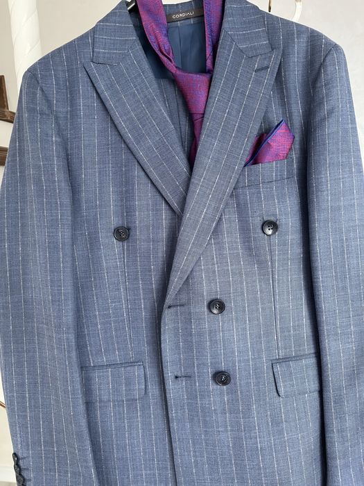 Костюмы 48 размер