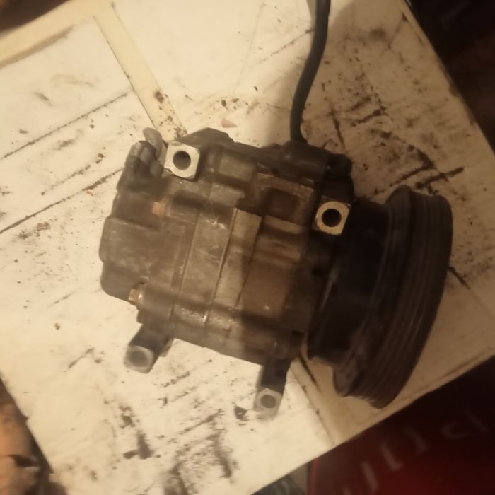 Компрессор кондера Мазда кронос     приемаси и    птичка.