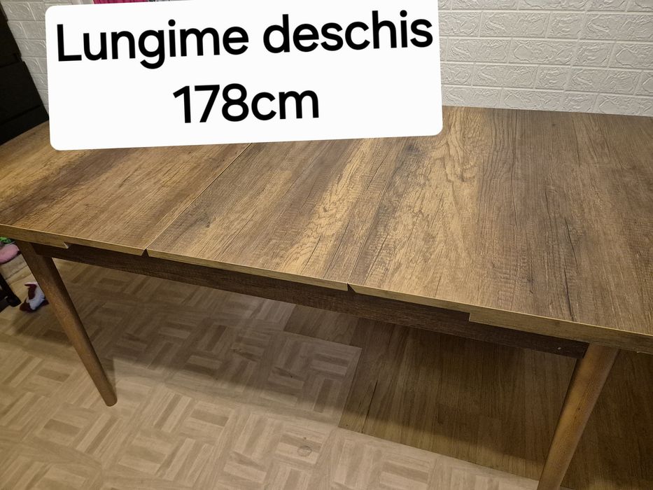 Masă de 6-8 pers.,extensibilă,foarte puțin utilizată