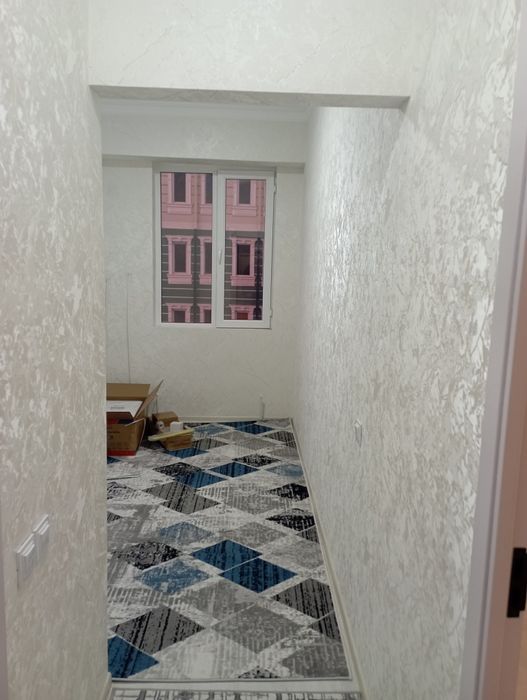 Yangi dom zamonaviy qurilgan Tinchlik plaza mehmonxonasi yonida