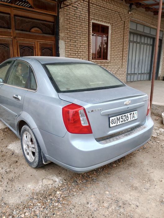 Lacetti 1.8  сотилади