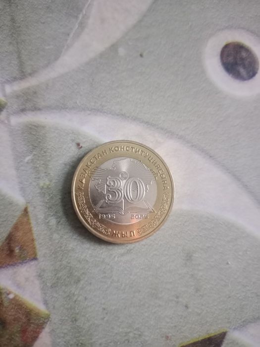 Продам монету 100 тнг юбилейное 30 летние,