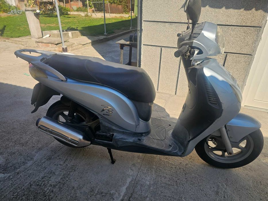 Скутер  Хонда 125i