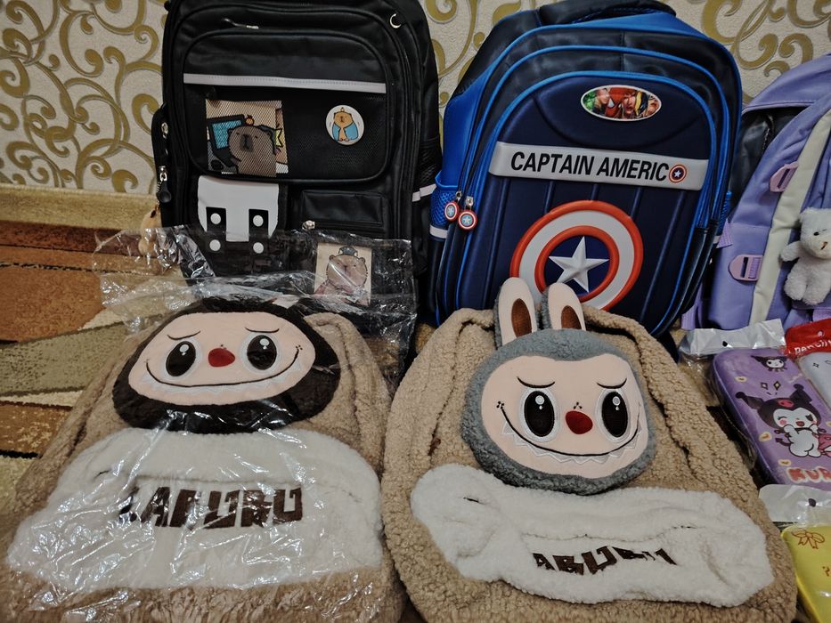 Игрушки и рюкзаки