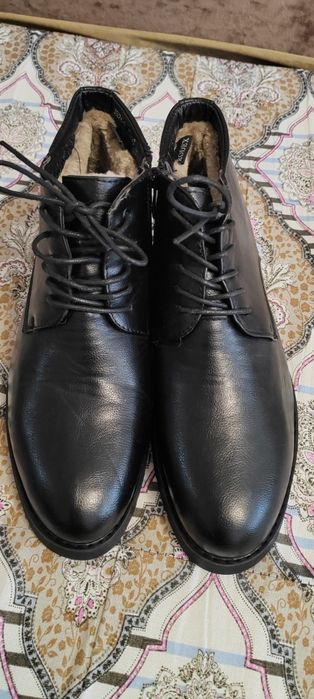 Продам зимние ботинки мужские