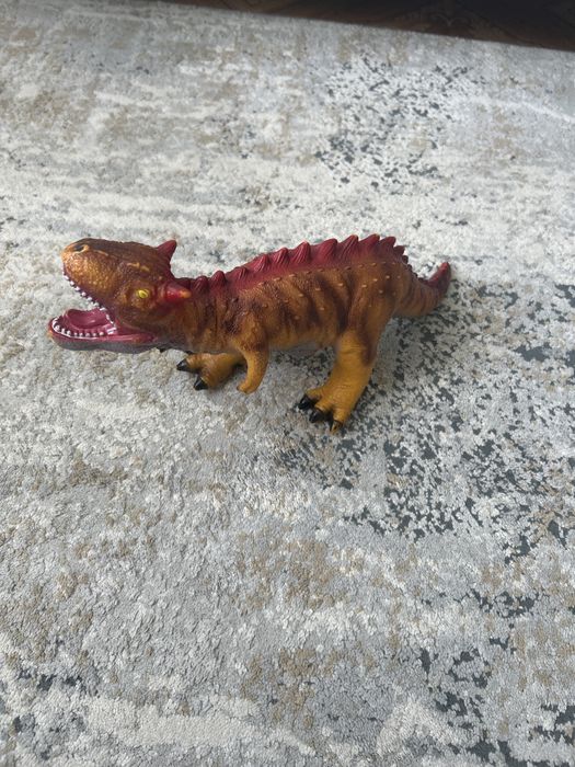 Игрушка динозавор