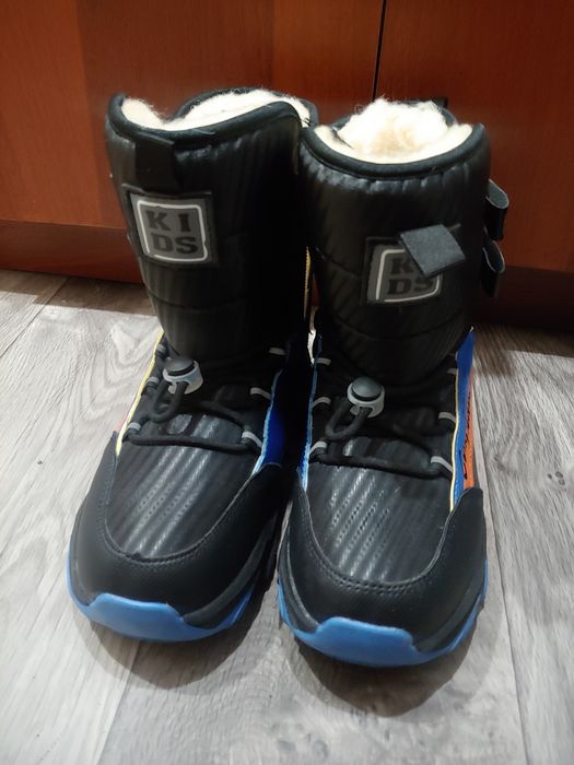 Продам новые зимние ботинки