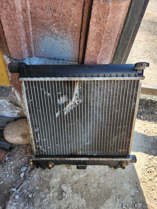 Мерседес 124 об2,3 радиатор