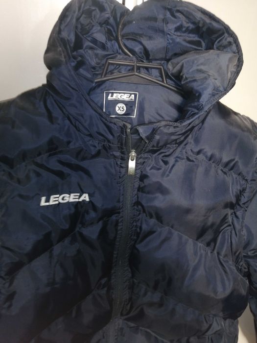 Пуховик новый на 10 лет