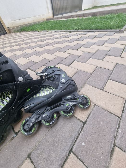 Role reglabile , merg pana la mărimea 39