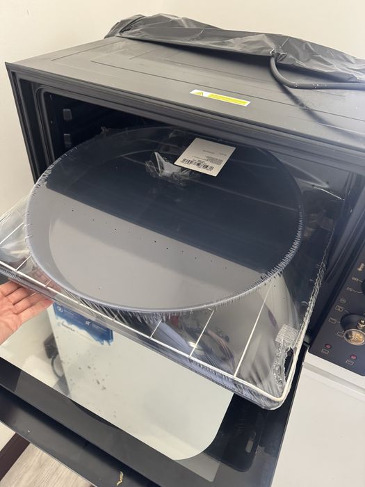 Мини- печь artel цвет черный.