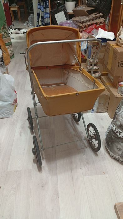 Детская коляска для кукол