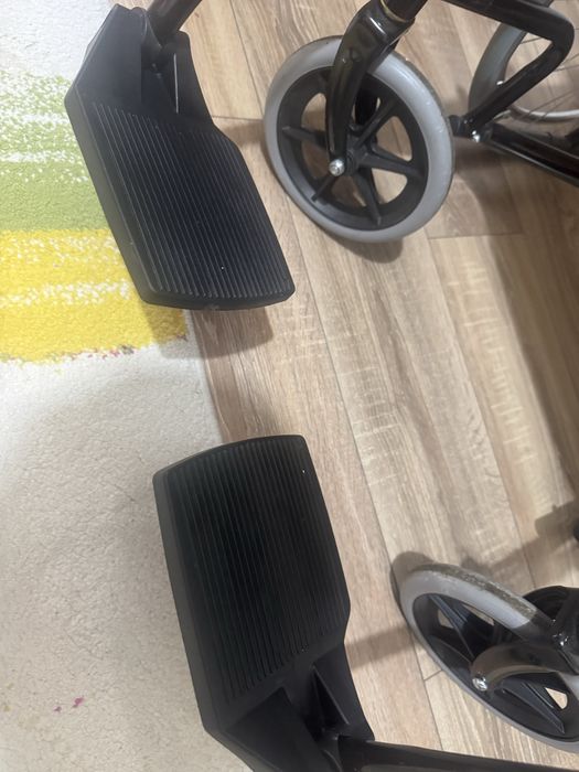 Scaun cu rotile din otel, matetial textil , negru