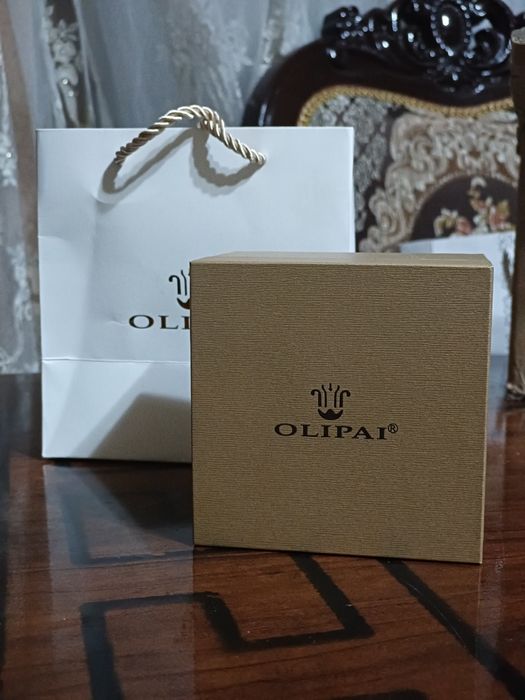 Часы бренда Olipai