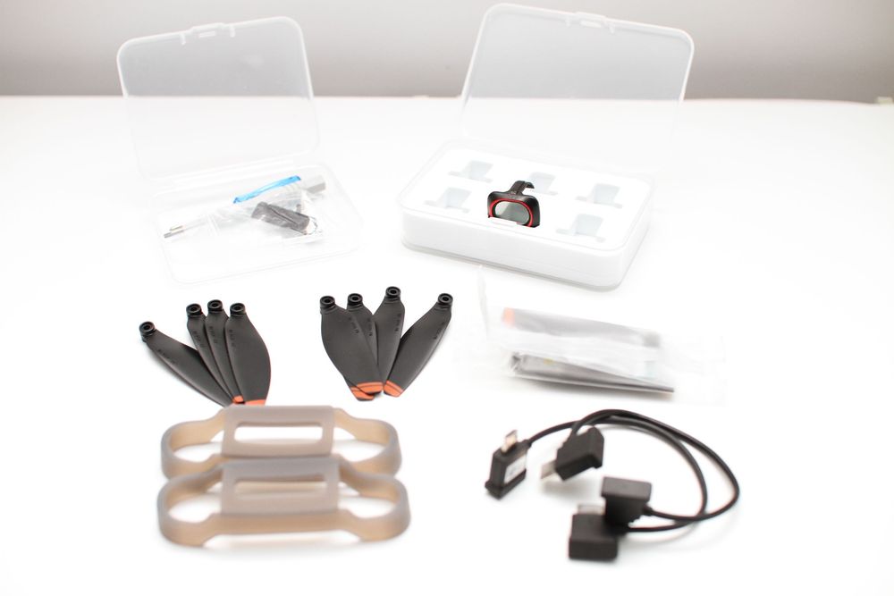 DJI Mini 4K, 2 acumulatori originali, charger, filtru CPL, accesorii diverse
