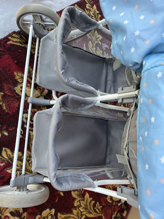 Егиздерге арналган каляска