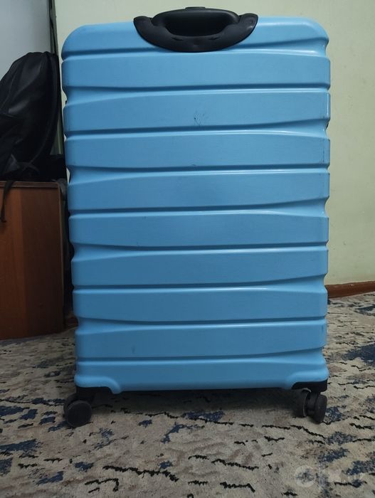 Yangi holatdagi katta o‘lchamli chamadon