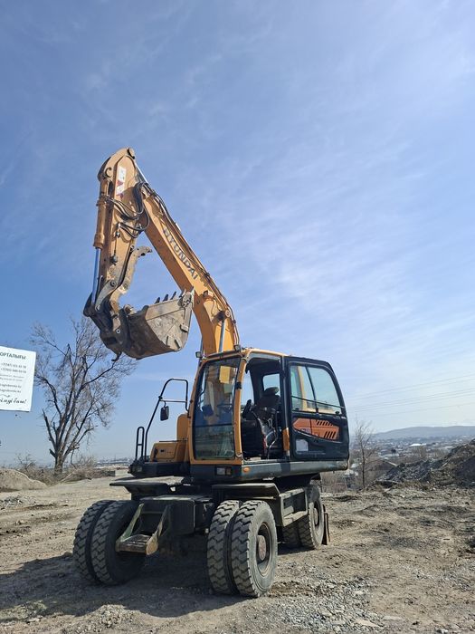 140+145 колеснои экскаватор