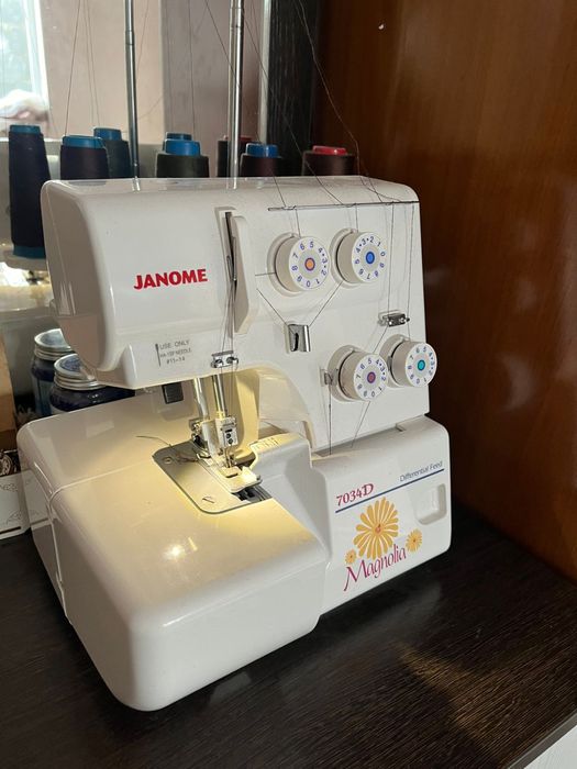 Оверлок Janome 7034 d.