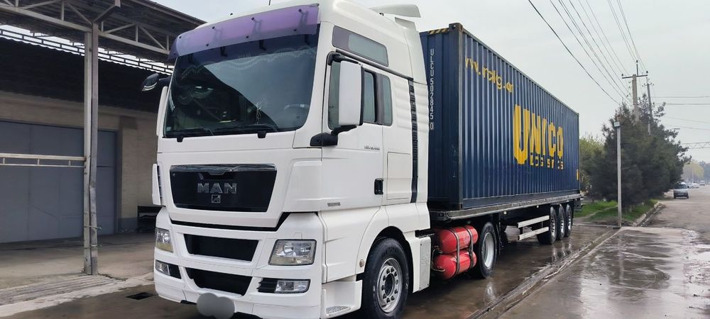 MAN TGX 18.440 + SCHMITZ Прицеп Сотилади