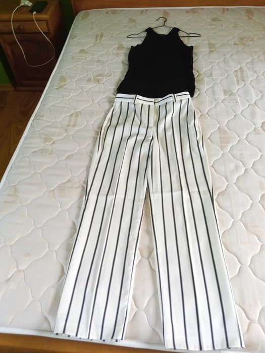 Дамски топ на марка Massimo dutti . Отговаря на размер S.