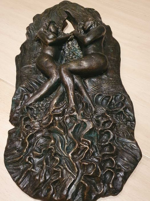 Скулптура за стена