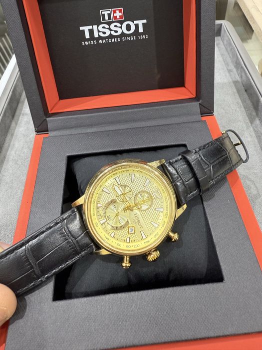 Золотые часы Tissot 750пробы