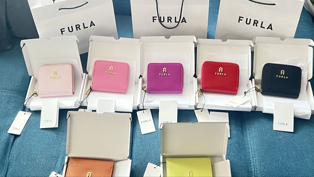 Furla Camelia в  няколко цвята и в два модела. Нови модели. С етикети care instuctions, подаръчен плик FURLA.Модел с цип и модел с капак.100% оригинал