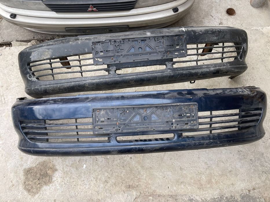 Бампер Передний Митсубиси Лансер Дутый