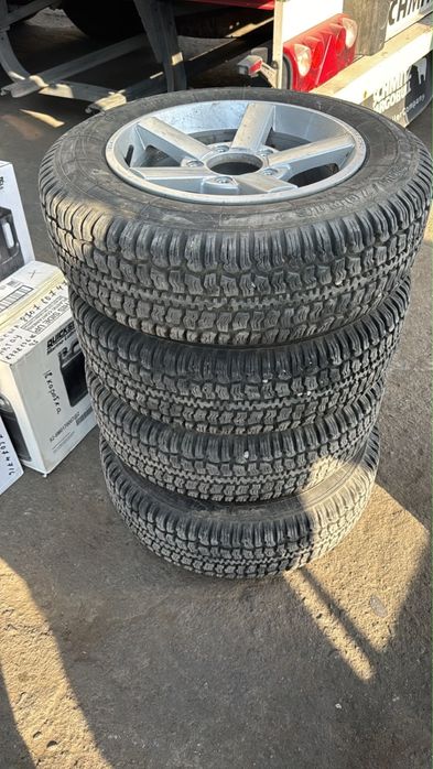 продам шины с дисками на ниву состояние как новые