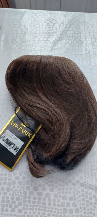 Новый парик в упаковке