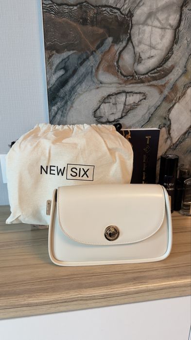 Продам кожаную сумку 23 см