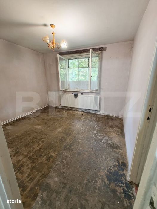 Apartament cu 2 camere la parter- nerenovat, 60 mp, zona Centru